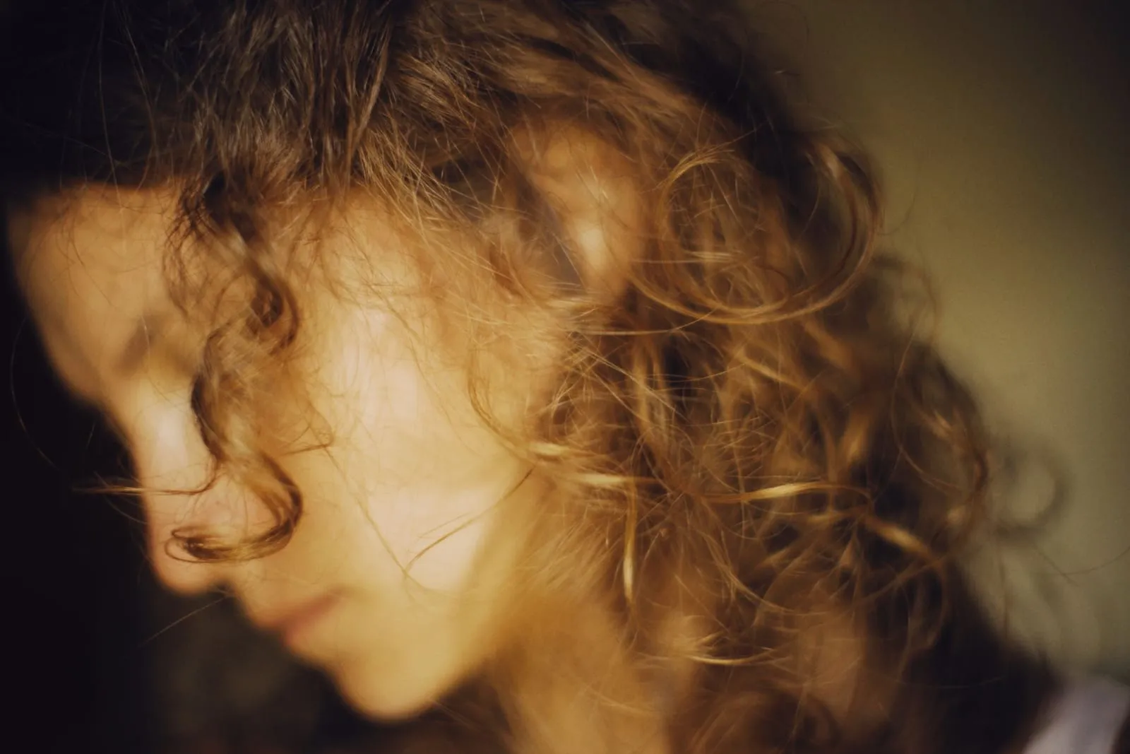 Close-up of soft, defined golden-brown curls