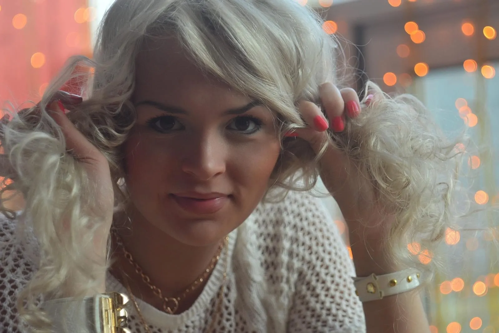 Smiling woman with soft blonde curls